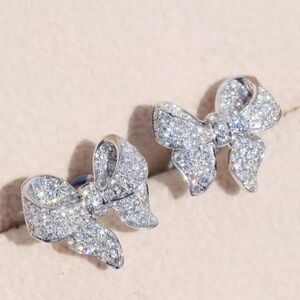 Bow Shaped Glittery Cubic Zirconia Sterling Silver Earrings